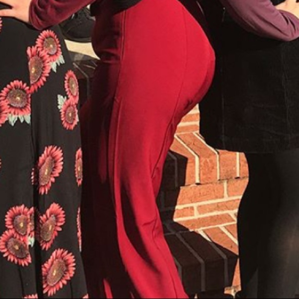 High waisted deep red trousers with belt sewn on